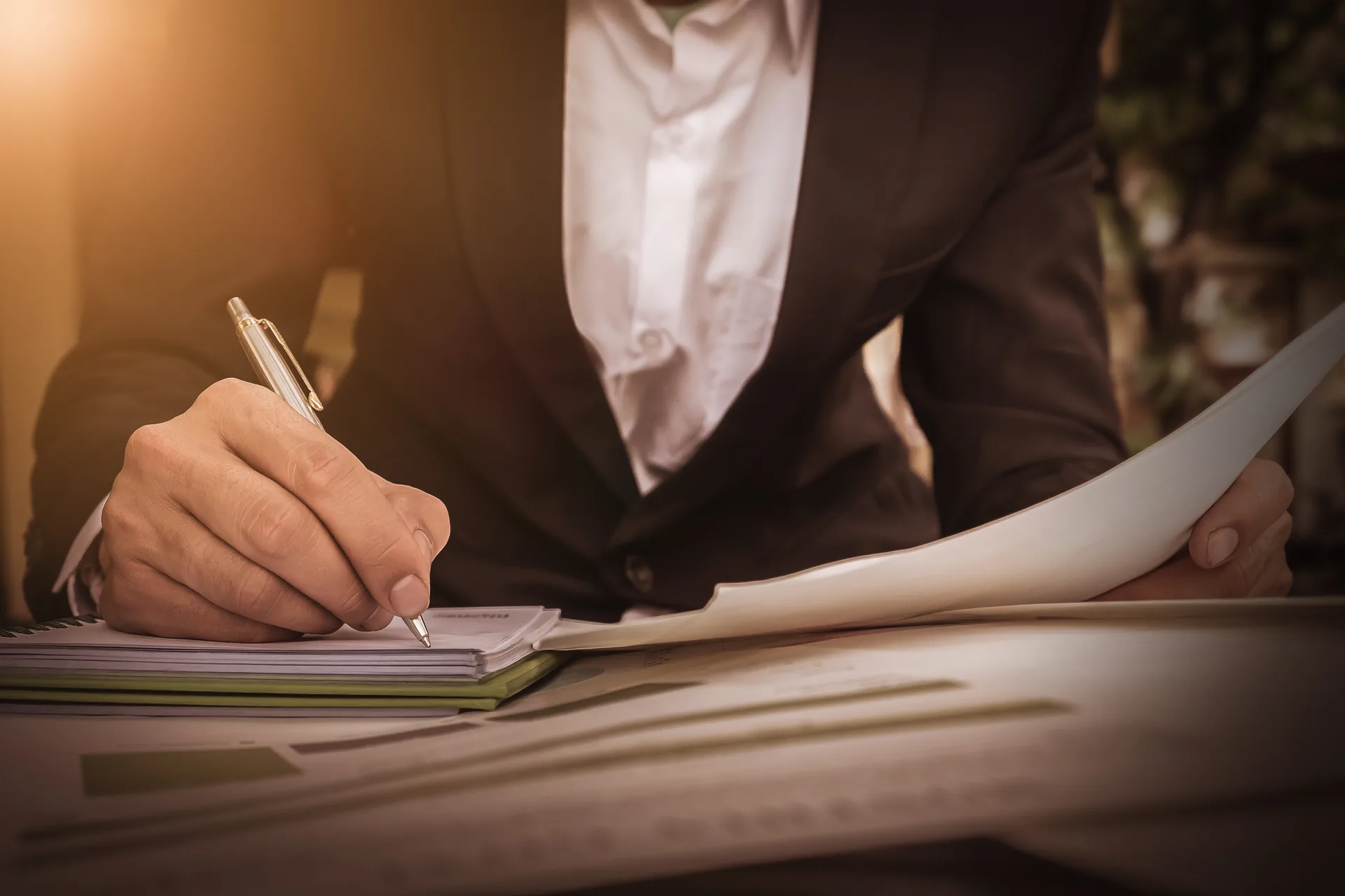 Legal professional signing a contract — Kenya's Common Law jurisdiction aligns with UK contracts